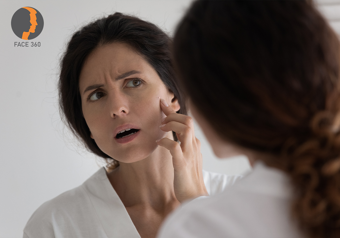 Unhappy woman about her skin health